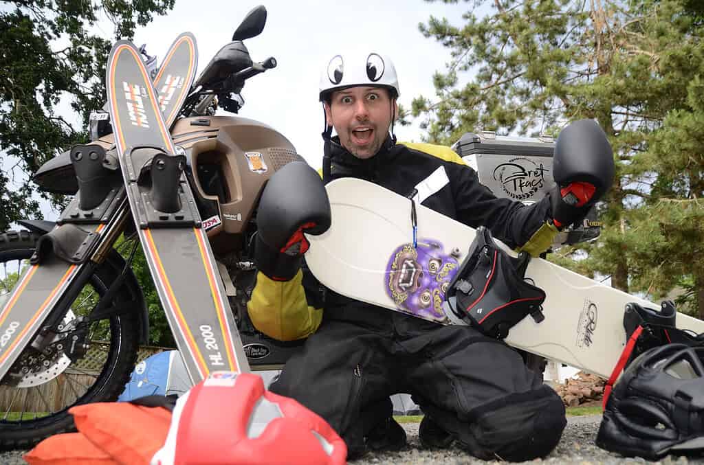 Bret Tkacs displaying a collection of cross-training gear.